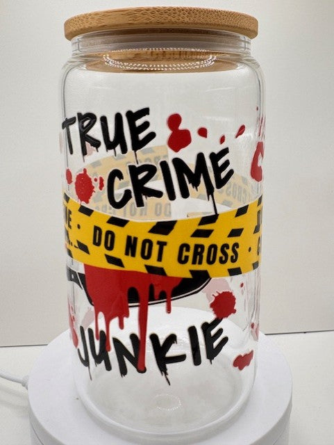 Glass jar with wooden lid featuring 'True Crime Junkie' text and design.